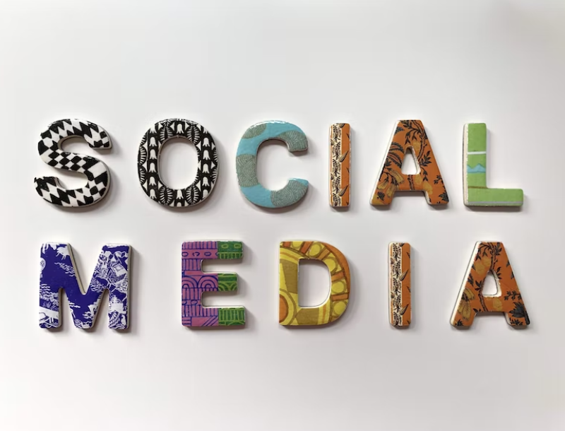 Social Media in bright colors with each letter in a different pattern