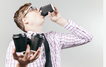 Pushes and coffee are good in moderation. This young man is gulping coffee from one cup and holding two more. Too much is too much.